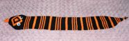 an orange and black striped rattle snake scarf